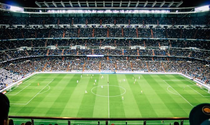 A packed stadium — high-pressing tactics electrify the crowd